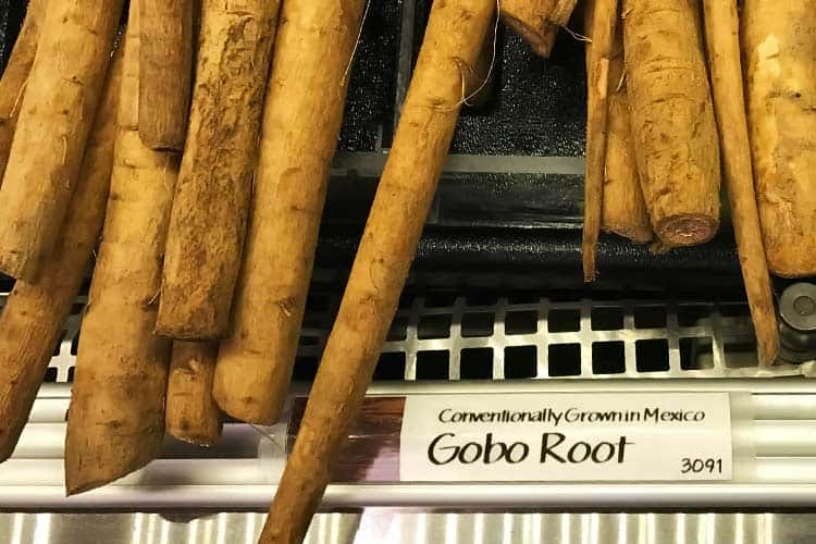 fresh raw gobo roots at grocery store