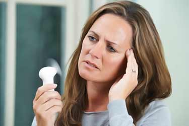 woman with menopause hot flashes