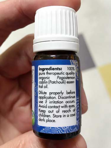 ingredients and safety warning on Simplers Botanicals organic pogostemon cablin