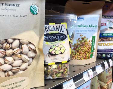 different brands of pistachios at store