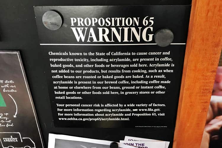 Starbucks Prop 65 warning sign for coffee acrylamide and cancer