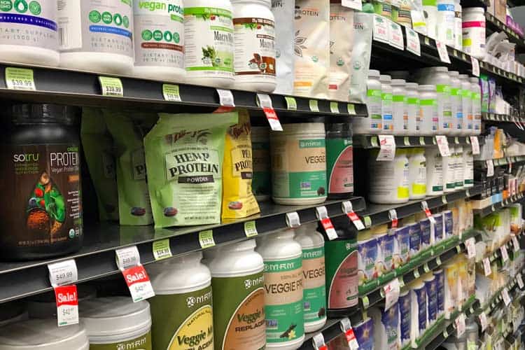 protein powders aisle at store