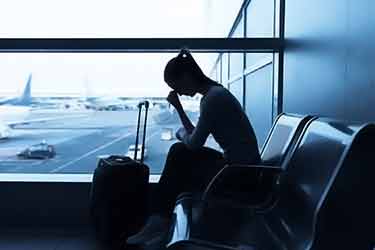 stressed woman at airport