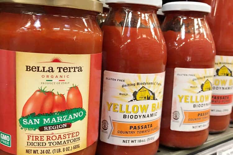 tomatoes in glass jars