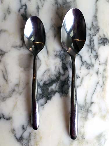 teaspoon next to tablespoon