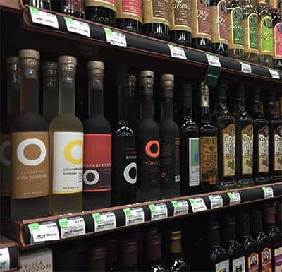 different vinegar types on Whole Foods shelf